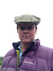 Trying out Bri's flat cap during a downpour.  What d'ya think?